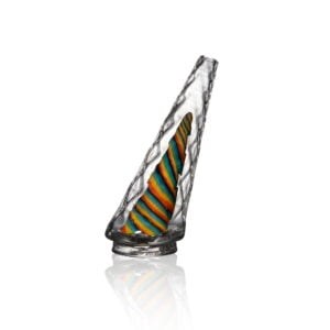 WIIDZ® Cameroon puffco peak pro glass attachment facing west. The glass attachment has geometric design, diamond cut styled out chamber that is transparent, and a red yellow green and black colored striped inner chamber.