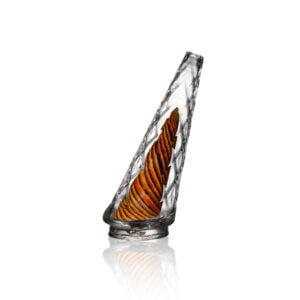 WIIDZ® Tigre puffco peak pro glass attachment facing west. The glass attachment has geometric design, diamond cut styled out chamber that is transparent, and a black yellow and orange colored striped inner chamber.