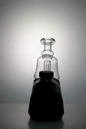 A Puffco Peak Pro glass attachment called Wiidz soc is installed on the device, positioned to face north.