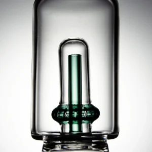 Close-up shot of the Puffco Peak Pro glass attachment featuring Wiidz Tipsy Green inner tube, highlighting its intricate design and vibrant color.