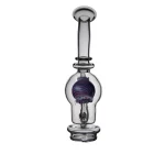 puffco peak glass attachment wiidz salon alt facing north.webp Puffco Peak glass attachment displayed in a Wiidz salon, showcasing a sleek design and modern aesthetics, oriented facing north for a stylish presentation.