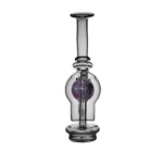puffco peak glass attachment wiidz salon alt facing south.webp Puffco Peak glass attachment showcased at Wiidz Salon, facing south, highlighting its sleek design and functionality for an enhanced dabbing experience.