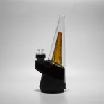 Puffco Peak Glass Wiidz Original 2.0 in yellow color, designed for east-facing orientation, showcasing its unique and vibrant design for enhanced dabbing experience.