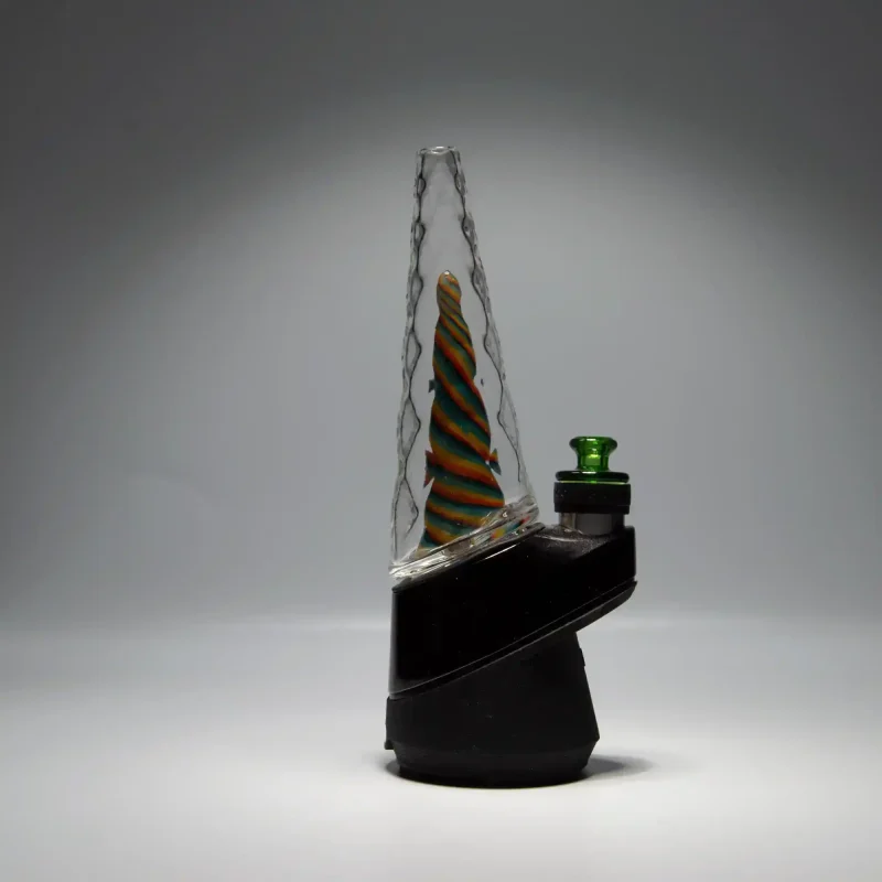 Puffco Peak Pro glass attachment featuring Wiidz design, installed in a westward orientation, showcasing its sleek style and functionality.