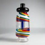 puffco peak pro glass attachment wiidz flask alt facing south.webp Puffco Peak Pro glass attachment with Wiidz flask, elegantly positioned facing south, showcasing modern cannabis culture accessories.