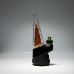 Puffco Peak Pro glass attachment Wiidz Tigre installed, showcasing a sleek design facing west.