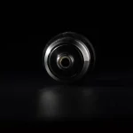 Puffco Peak Atomizer with WIIDZ 3D Chamber, displayed lying down, showcasing its unique design and features.