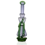 puffco peak glass attachment wiidz dark elf facing north.webp Puffco Peak glass attachment Wiidz Dark Elf facing north, showcasing sleek design and vibrant colors for an enhanced dabbing experience.