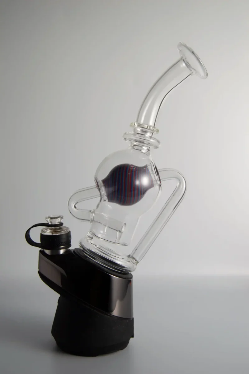 Puffco Peak glass attachment installed on Wiidz salon, oriented to the east, showcasing a scaled 1 design for enhanced vaporization experience.
