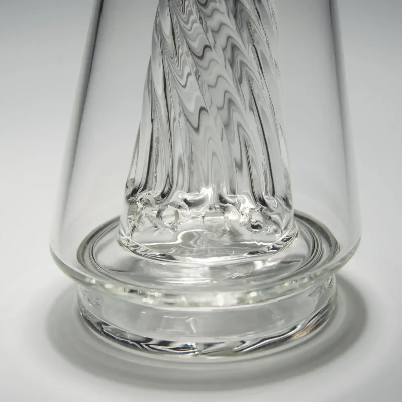 Close-up view of the Puffco Peak Glass Wiidz Original 2.0 featuring a clear center bottom, showcasing its unique design and craftsmanship.