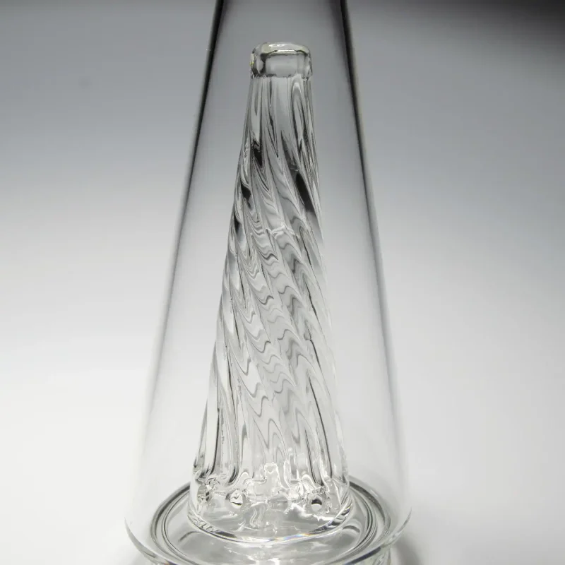 Close-up view of the Puffco Peak Glass Wiidz Original 2.0 featuring a clear center, showcasing exquisite craftsmanship and design details.