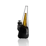 puffco peak glass wiidz original2.0 yellow facing southeast.webp Puffco Peak Glass Wiidz Original 2.0 in vibrant yellow, showcasing its sleek design while facing southeast, perfect for high-quality dabbing experiences.