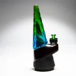 puffco peak pro glass attachment WIIDZ rainbow installed facing west.webp Puffco Peak Pro glass attachment WIIDZ in vibrant rainbow colors installed facing west, showcasing a stylish and functional upgrade for enhanced dabbing experiences.