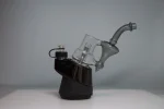 puffco peak pro glass attachment wiidz sherlock black installed facing east scaled 1.webp Puffco Peak Pro glass attachment featuring Wiidz Sherlock design in black, installed facing east, showcasing a sleek and modern aesthetic perfect for enhanced dabbing experiences.