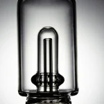puffco peak pro glass attachment wiidz tipsy black inner tube close up shot.webp Close-up image of the Puffco Peak Pro glass attachment featuring Wiidz Tipsy in black with an inner tube design, highlighting its sleek and modern aesthetics.
