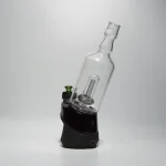 puffco peak pro glass attachment wiidz tipsy black installed facing south east white background.webp Puffco Peak Pro glass attachment with Wiidz Tipsy in black installed, oriented southeast against a clean white background.