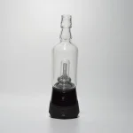 puffco peak pro glass attachment wiidz tipsy black installed facing south white background.webp Puffco Peak Pro glass attachment with Wiidz Tipsy in black installed facing south, set against a clean white background, showcasing its sleek design and functionality.