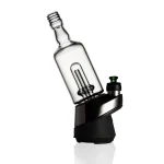 puffco peak pro glass attachment wiidz tipsy black installed facing west with shadow.webp Puffco Peak Pro glass attachment in Wiidz Tipsy Black color installed, oriented towards the west, with a shadow effect creating a striking visual contrast.