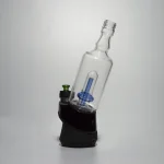puffco peak pro glass attachment wiidz tipsy blue installed facing south east white background.webp Puffco Peak Pro glass attachment in Wiidz Tipsy Blue, installed at a southeast angle, displayed on a clean white background.