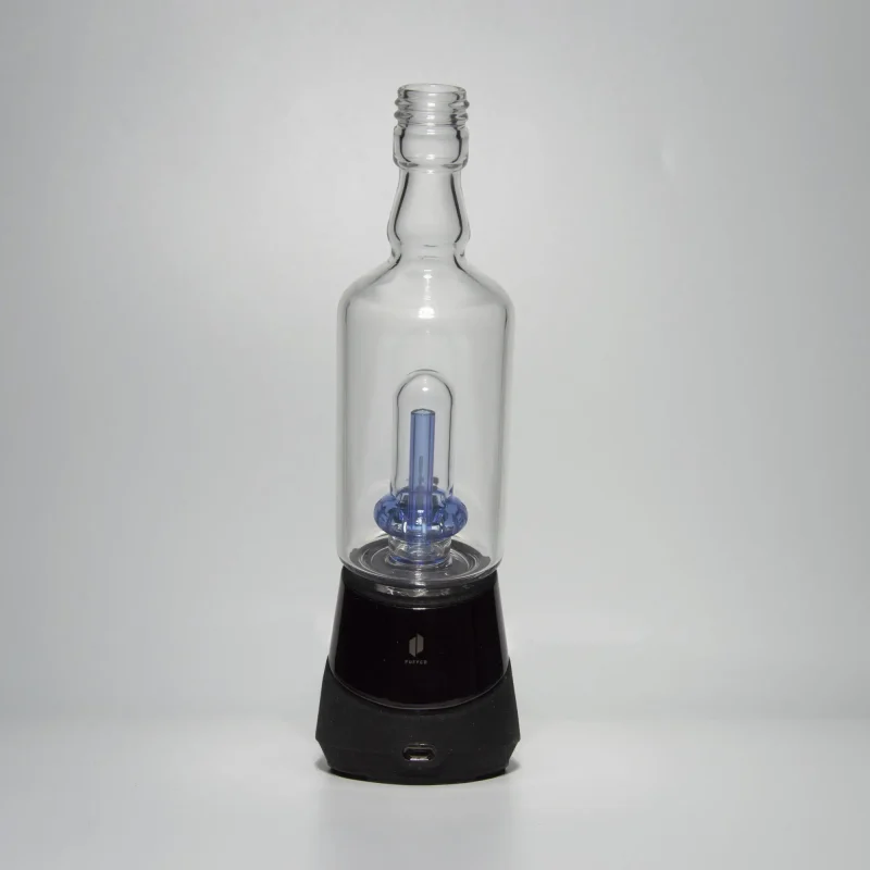 Puffco Peak Pro glass attachment in Wiidz Tipsy Blue, installed facing south against a white background.